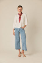 Blusa fina cuello pico blanco
