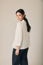 Blusa cuello chimenea blanco