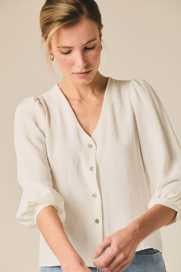 Blusa fina cuello pico blanco