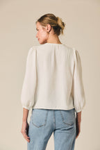 Blusa fina cuello pico blanco